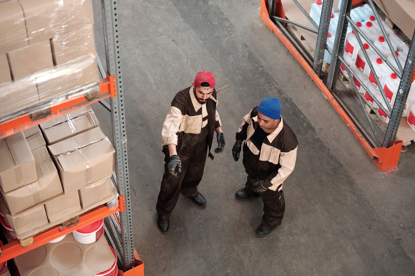 SME team members discussing operations inside a warehouse